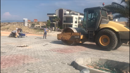 ANA YOL PARKE TAŞ DÖŞEME ÇALIŞMASI FAALİYETLERİNE AİT GÖRÜNTÜLER.